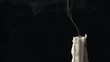 Candle blow off with smoke isolated on black background