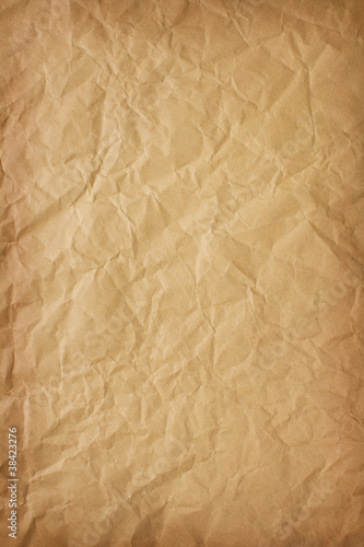 Photo: crumpled brown paper background crumpled brown paper background