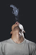 Man with pistol made of smoke Man with pistol made of smoke