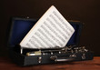 old clarinet and notebook with notes in case old clarinet and notebook with notes in case