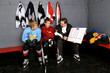 Coach Gives Lessons To Hockey Players in Dressing Room