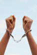 Handcuffed woman's hands