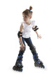 Photo: The little girl on roller skates The little girl on roller skates