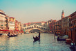 Rialto Bridge and gondolas  in Venice.