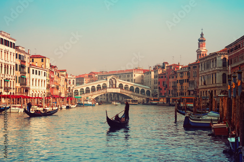 Photo: Rialto Bridge and gondolas in Venice. Rialto Bridge and gondolas in Venice.