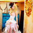 blond fashion woman in vintage baroque with umbrella