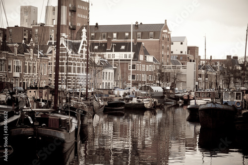 Photo: Houseboats in a canal in the city Houseboats in a canal in the city