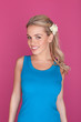 Smiling Blond Woman With Flower In Hair