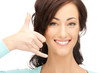 woman making a call me gesture