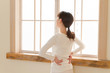 Photo: Beautiful young woman relaxing in the bedroom Beautiful young woman relaxing in the bedroom