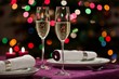 Foto: Christmas table setting with sparkling wine Christmas table setting with sparkling wine