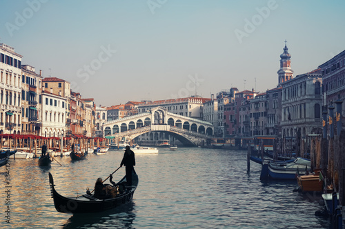 Photo: Rialto Bridge and gondolas in Venice. Rialto Bridge and gondolas in Venice.