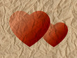 Two hearts on a crumpled paper Two hearts on a crumpled paper
