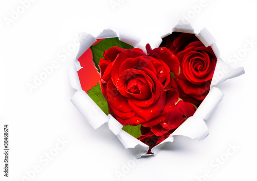 Photo: Art bouquet of red roses and the paper hearts on Valentine's Day Art bouquet of red roses and the paper hearts on Valentine's Day