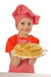 Happy little girl with pancakes
