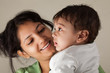 Indian mother and baby smiling
