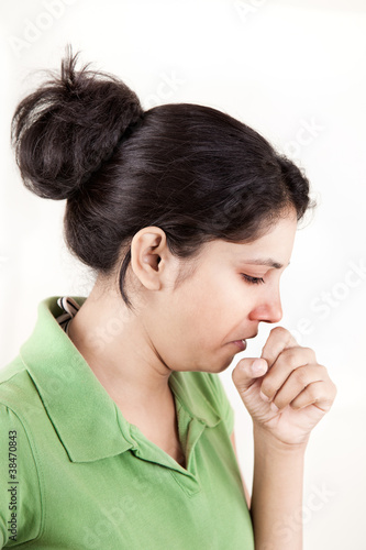 Photo: Indian girl in cold coughing Indian girl in cold coughing