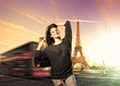 Photo: Woman visiting Paris in France with the Eiffel tower Woman visiting Paris in France with the Eiffel tower