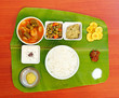 Traditional southern-indian meals on plantain leaf