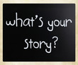 "What is your story" handwritten with white chalk on a blackboar