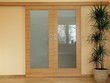 Photo: Sliding wooden door with dracena plant Sliding wooden door with dracena plant