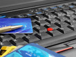 Credit cards and pen on computer keyboard
