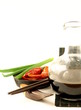 Soy sauce in bowl with chopsticks