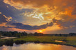 Beautiful spring sunrise and dramatic clouds on the sky.