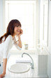 attractive asian woman in the bathroom