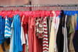 Colourful clothes on hangers