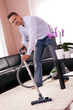 He cleaned the carpet, vacuum cleaner.