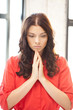 praying businesswoman