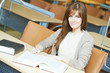 young student girl study with book in library