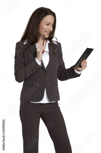 Photo: Businesswoman Holding Tablet Device Businesswoman Holding Tablet Device