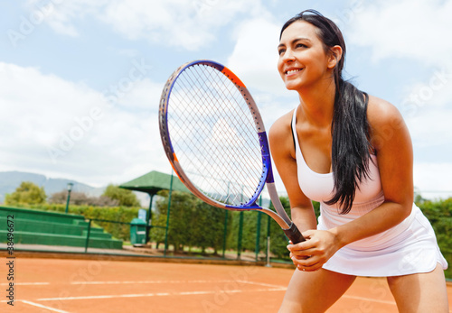 Photo: Woman playing tennis Woman playing tennis