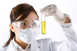 Photo: Portrait of a scientist analyzing a solution. Portrait of a scientist analyzing a solution.