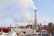 smoke from industrial plant in center of big city