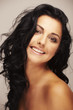 beautiful brunett model in studio on light background
