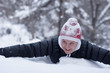 Foto: Cheerful girl in winter wood. Cheerful girl in winter wood.