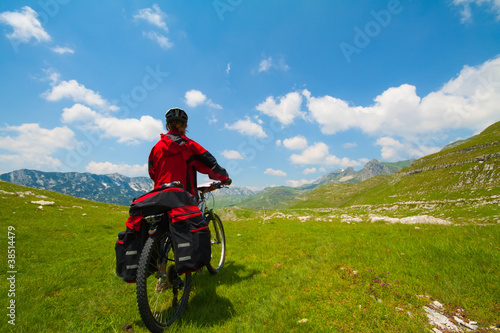 Photo: Woman with mountain bike Woman with mountain bike