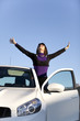 Woman enjoing her new car