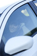 Woman driving holding a cellphone