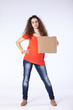 Woman holding a blank cardboard