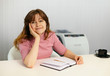 Smiling girl in the office