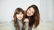 Teens embracing and looking at camera
