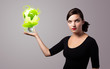 woman holding virtual eco sign woman holding virtual eco sign