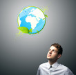 businessman holding virtual eco sign businessman holding virtual eco sign