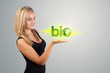 woman holding virtual eco sign woman holding virtual eco sign