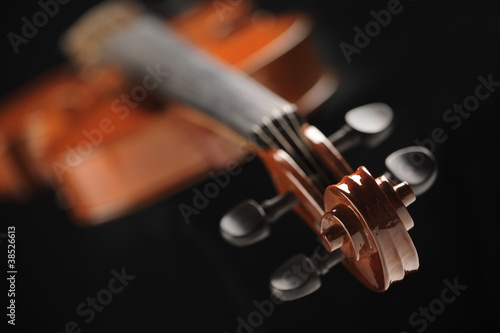 Photo: close up shot of a violin, shallow deep of field close up shot of a violin, shallow deep of field