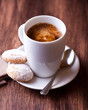 Cup of coffee and two biscotti